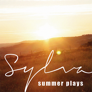bright golden landscape summer plays in white font overlaying image